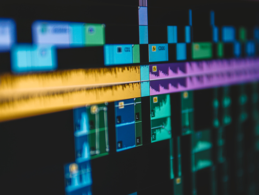 Creative branding work shown through a digital design and editing timeline with layered visuals.
